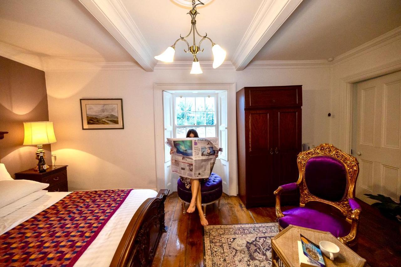 Clone Country House Aughrim Exterior foto A guest reading the Irish Times in the hotel